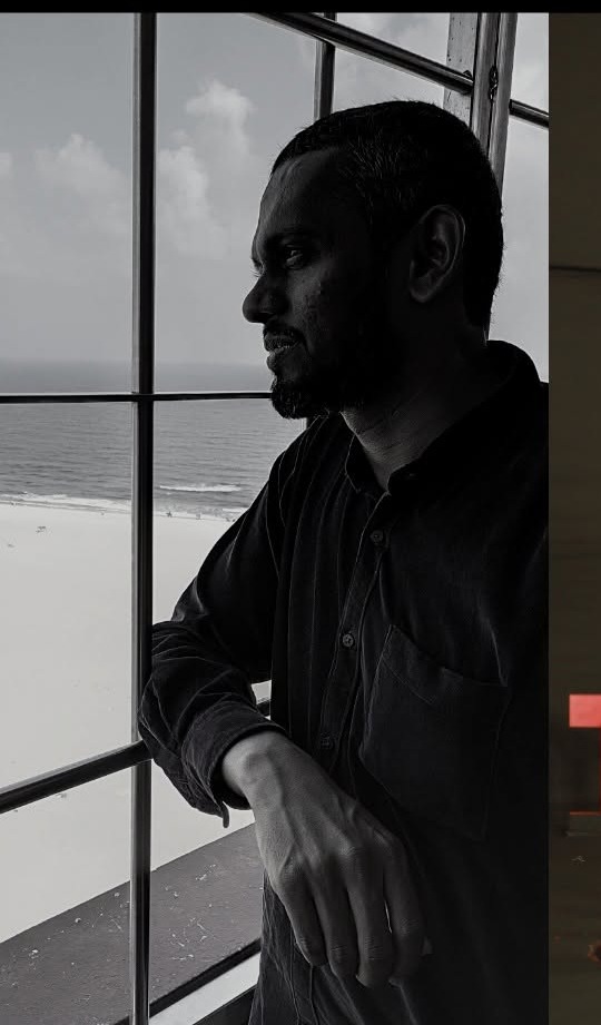 Fatha Khan in 2004, looking out of a window after losing his call centre job
